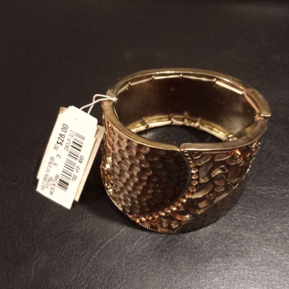Gold tone metal stretch cuff bracelet